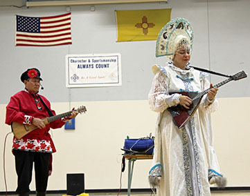 Elina Karokhina (balalaika), Mikhail Smirnov (guitar), Russian traditional song, Kamarinskaiya, Sixth Grade Academy, Lovington, New Mexico, photo by Jaycie Chesser