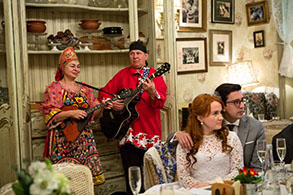 The celebration included jugs of vodka and a continuous loop of folk songs from the old country performed by NY Balalaika Duo Mikhail Smirnov and Elina Karokhina. Of her new husband, Ms. Berestovskaya said, "He taught me how to love."  Photo Credit: Jessica Lehrman for The New York Times, NY Balalaika Duo, Mikhail Smirnov, Elina Karokhina